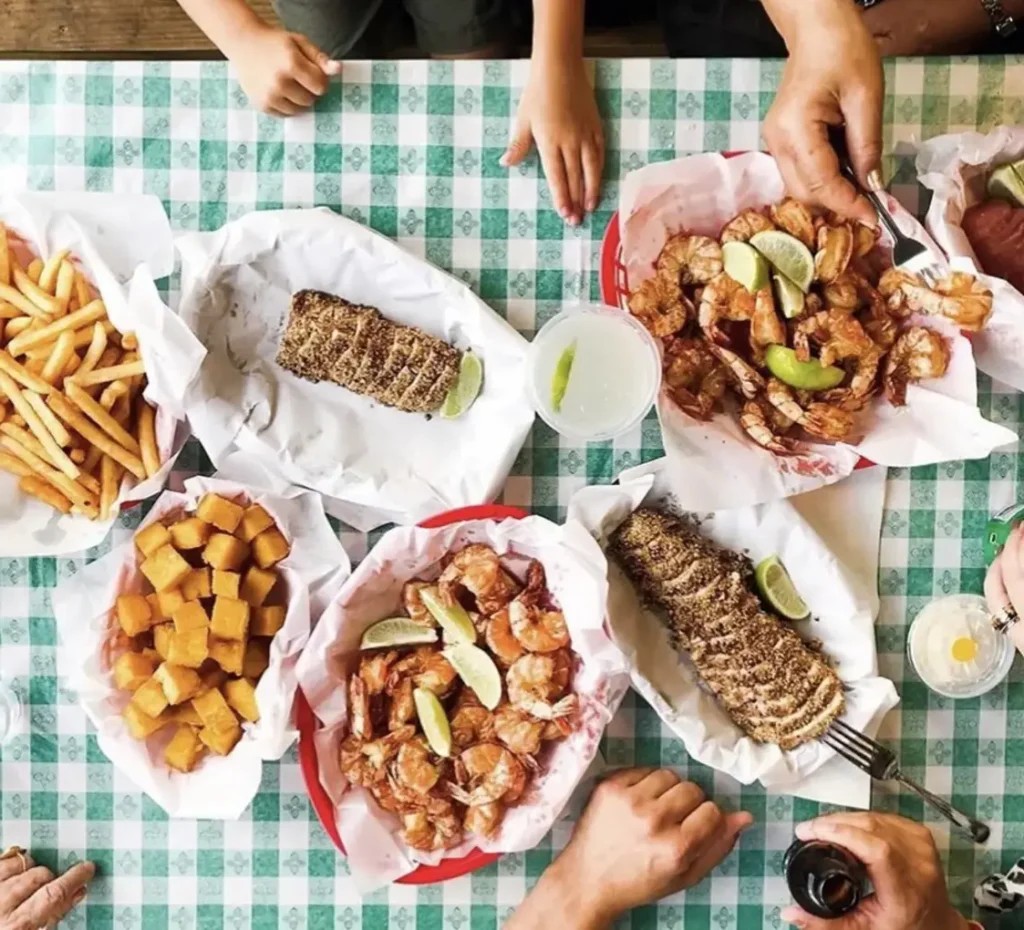 An assortment of local dishes on a table in Curacao restaurant